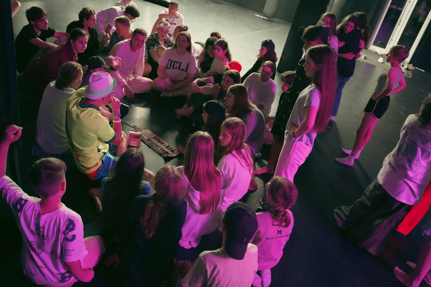 A group of teenagers participating in a creative workshop.